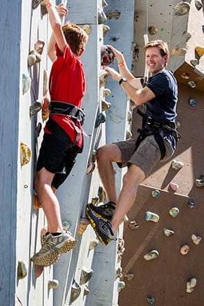 people scaling Loon's climbing wall