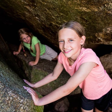 kids exploring Loon Mountain's summit caves