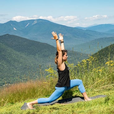 picture of group yoga practice on the summit of Loon Mountain Resort, NH