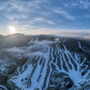 winter drone shot of Loon Mountain Resort