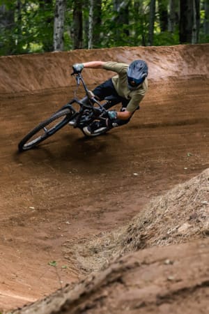 riding bike on dirt berm