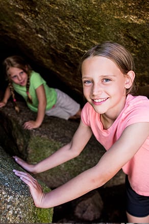 kids exploring Loon Mountain's summit caves